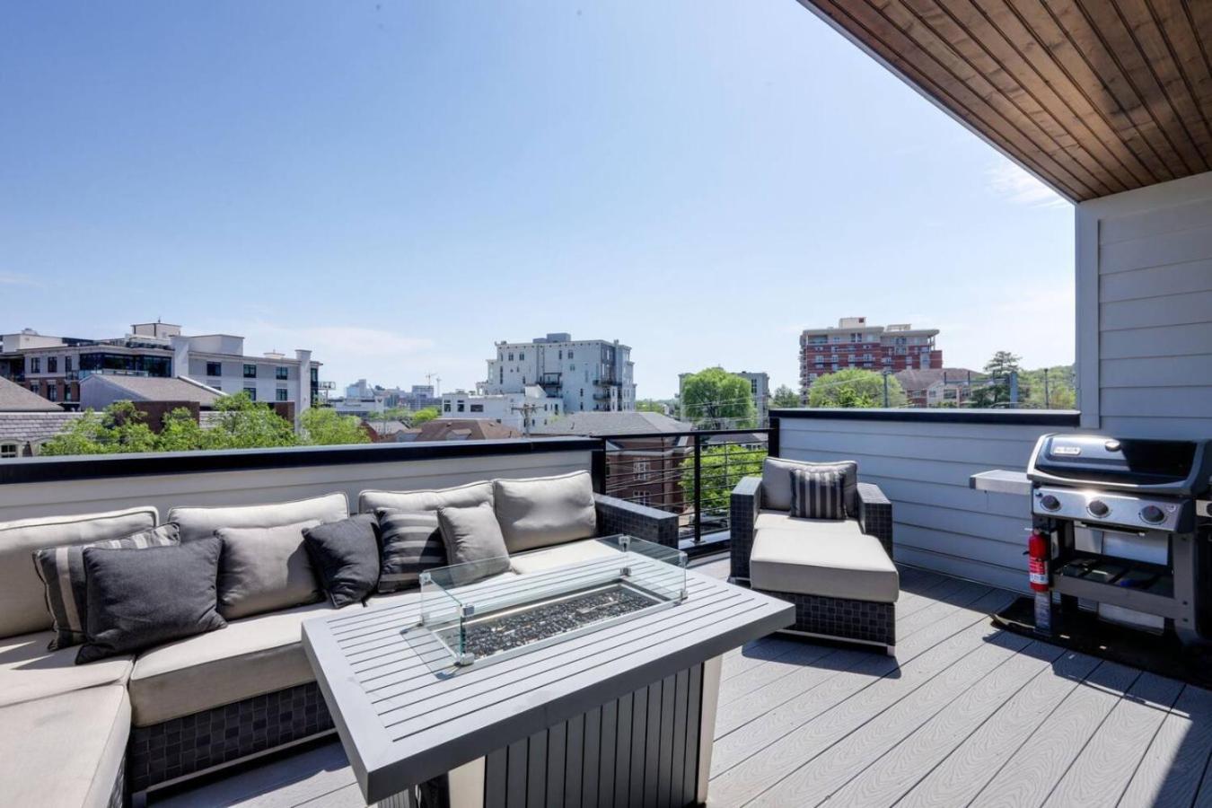 Two Townhomes Rooftop Lounges With Skyline Views