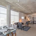 Gaze At Sprawling Green Vistas Through Walls Of Windows