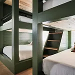 Stylish 3 Bed Retreat, Rooftop, Parking, Sleeps 10, Ensuite Baths, Bunk Room, Gourmet Kitchen, Cozy Living Space, Rooftop Views & Fire Table, Near Downtown, Distilleries & Marathon Village, 24 Hr Hospitality *