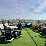 Large Rooftop, Murals, Skyline Views, Five Mins To Stadium Less Than 10 Mins To 5 Points And Broadway, Rooftop Grill, Garage Spaces And Ample Parking, 24 Hr Hospitality, Great For Groups