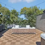 Apartment Getaway Rooftop Views & Modern Comfort