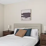 Spacious Living Room With Fireplace And Balcony