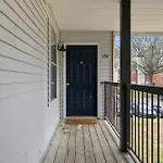 Spacious Living Room With Fireplace And Balcony