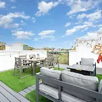 Outlaw-rooftop Patio & Game Room-mins To Broadway