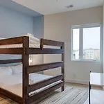 Holiday home Sleeps 44 4 Themed Lofts W Skyline Balconies Neon Backdrops Glam Kitchens—perfect For Group The Swift Retreat By Avantstay *