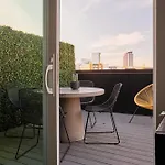 Sobro Studio With Patio City Views Rooftop + Gym Walk To Broadway Stylish Unit Community Amenities Paid Garage Parking 24 7 Hospitality