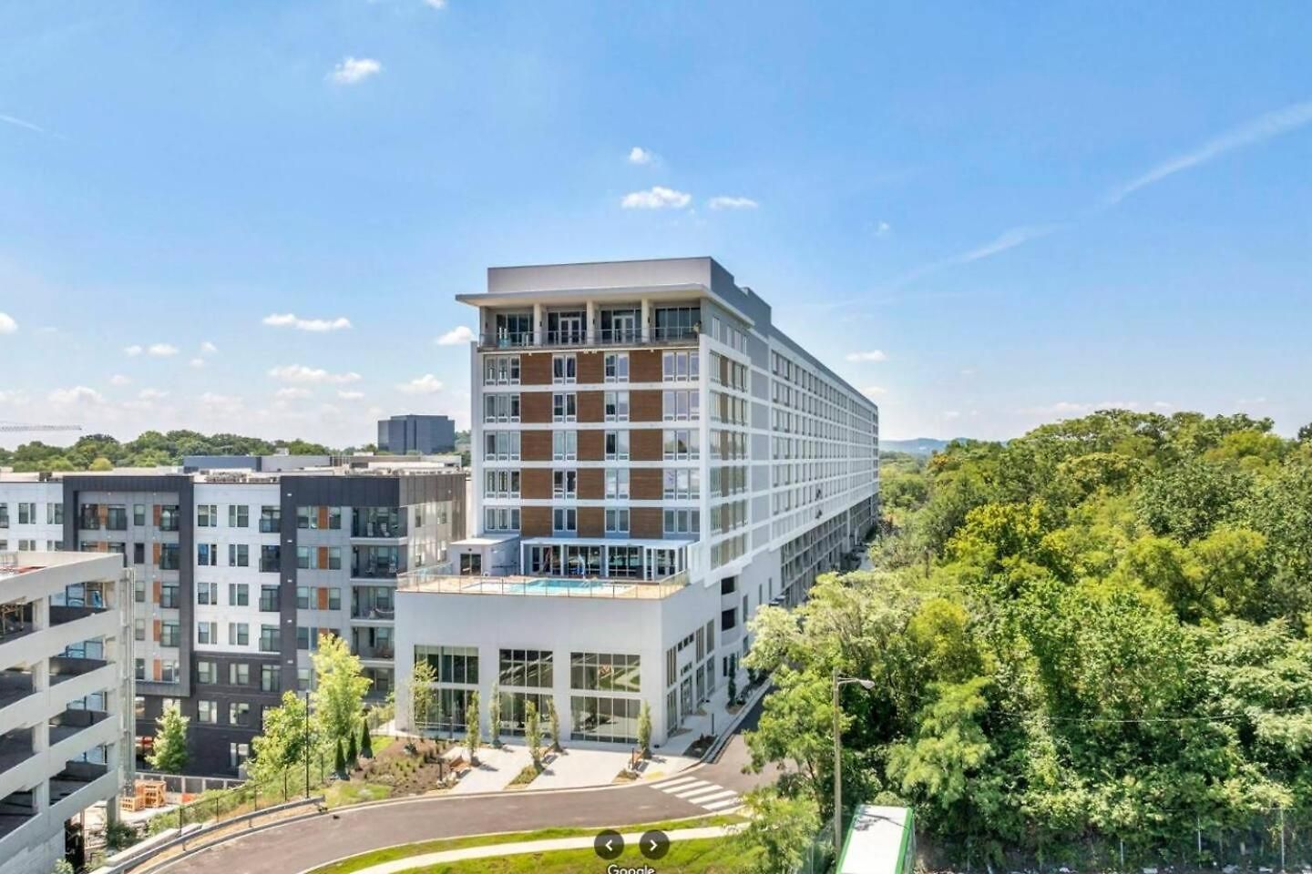 Apartment Retreat Pool, Gym, Rooftop Lounge & Free Parking