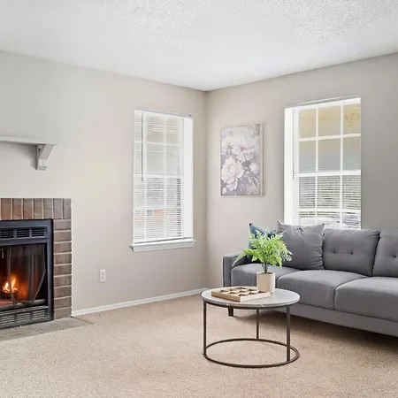 Spacious Living With Fireplace And Balcony