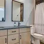 Stylish 4bed Retreat With Rooftop, Garage, Peloton, Sleeps 12, Fire Table, Gourmet Kitchen, Cozy Living Space, Dedicated Parking, Near Distilleries, Marathon Village And Nightlife, Chic Skyline Views, 24 Hour Hospitality * Nashville